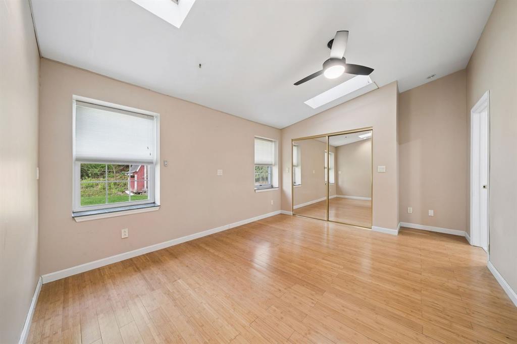 446 Diablo Drive Pittsburgh, PA 15241 - Photo 20 of 39 a view of an empty room with wooden floor and a window