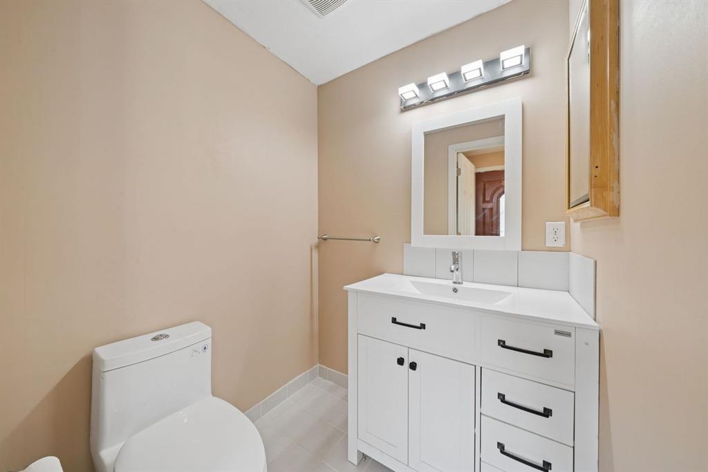 446 Diablo Drive Pittsburgh, PA 15241 - Photo 23 of 39 a bathroom with a toilet sink and mirror