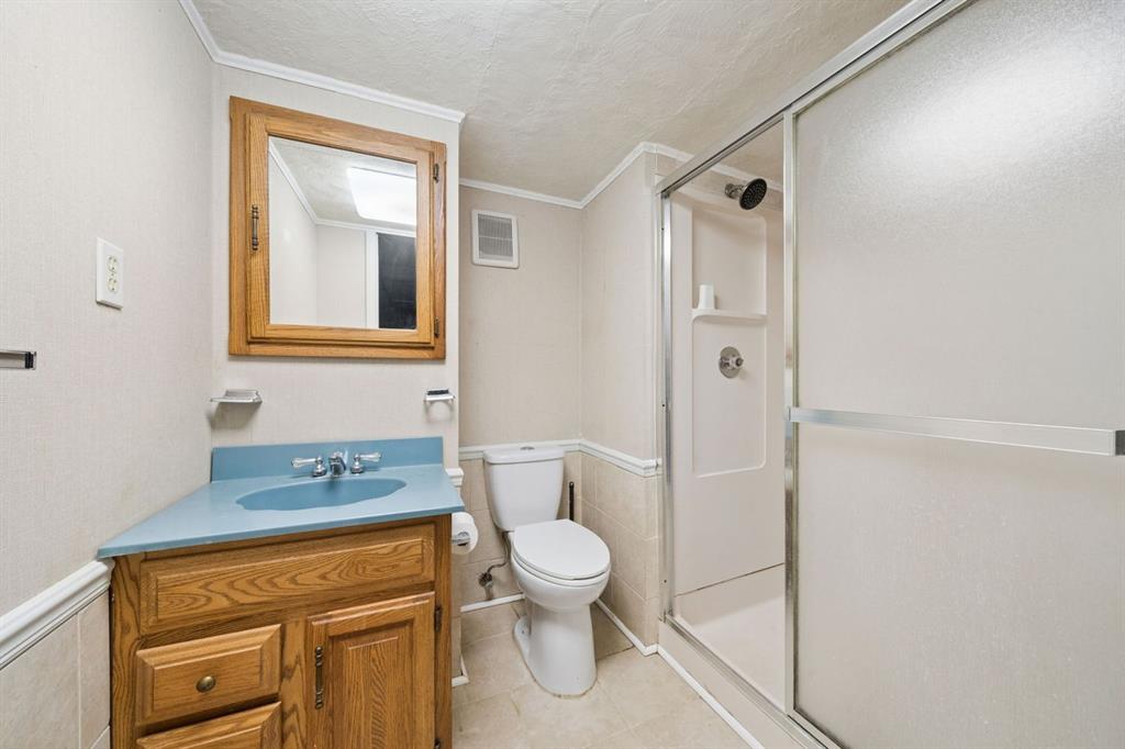 446 Diablo Drive Pittsburgh, PA 15241 - Photo 33 of 39 a bathroom with a granite countertop sink toilet and shower