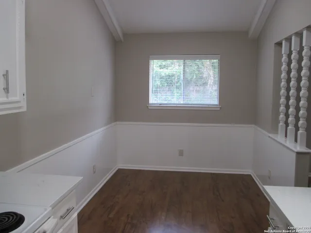 an empty room with a window