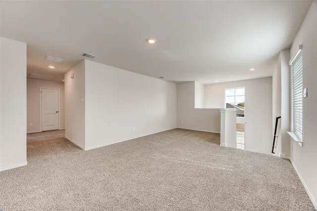 a bathroom with a sink double vanity and a mirror