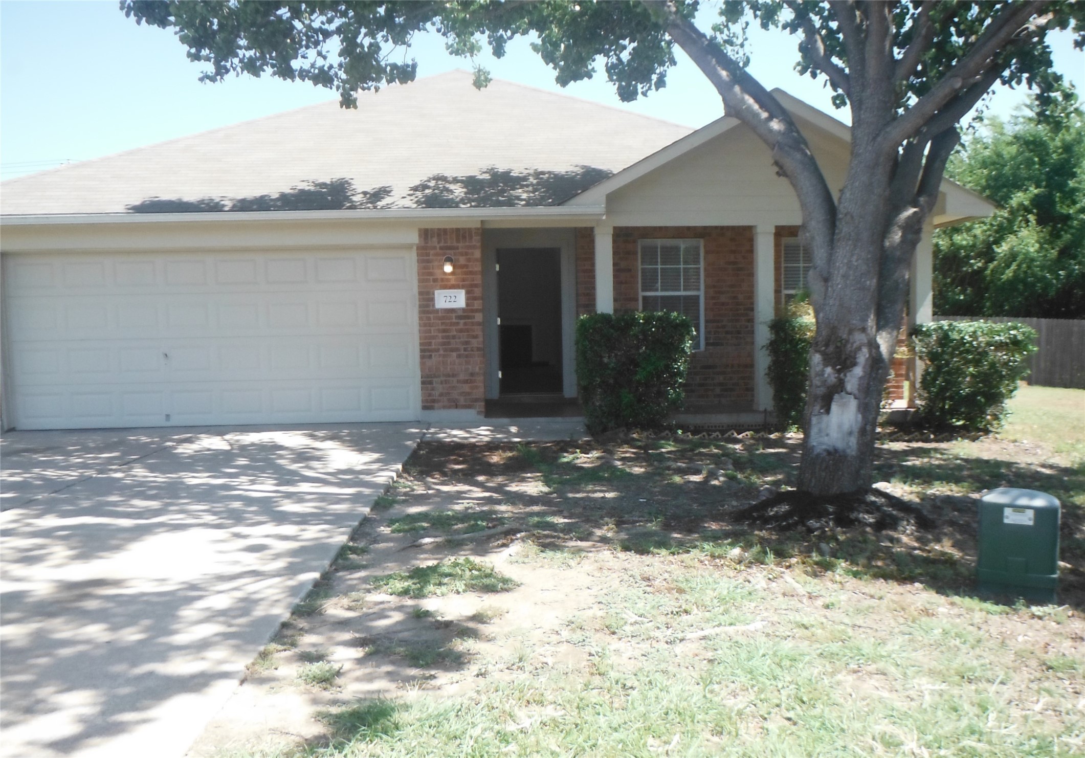 722 Ranier Lane Round Rock, TX 78665 - Photo 1 of 24 Classic brick accents and a welcoming front porch define this single-level home.