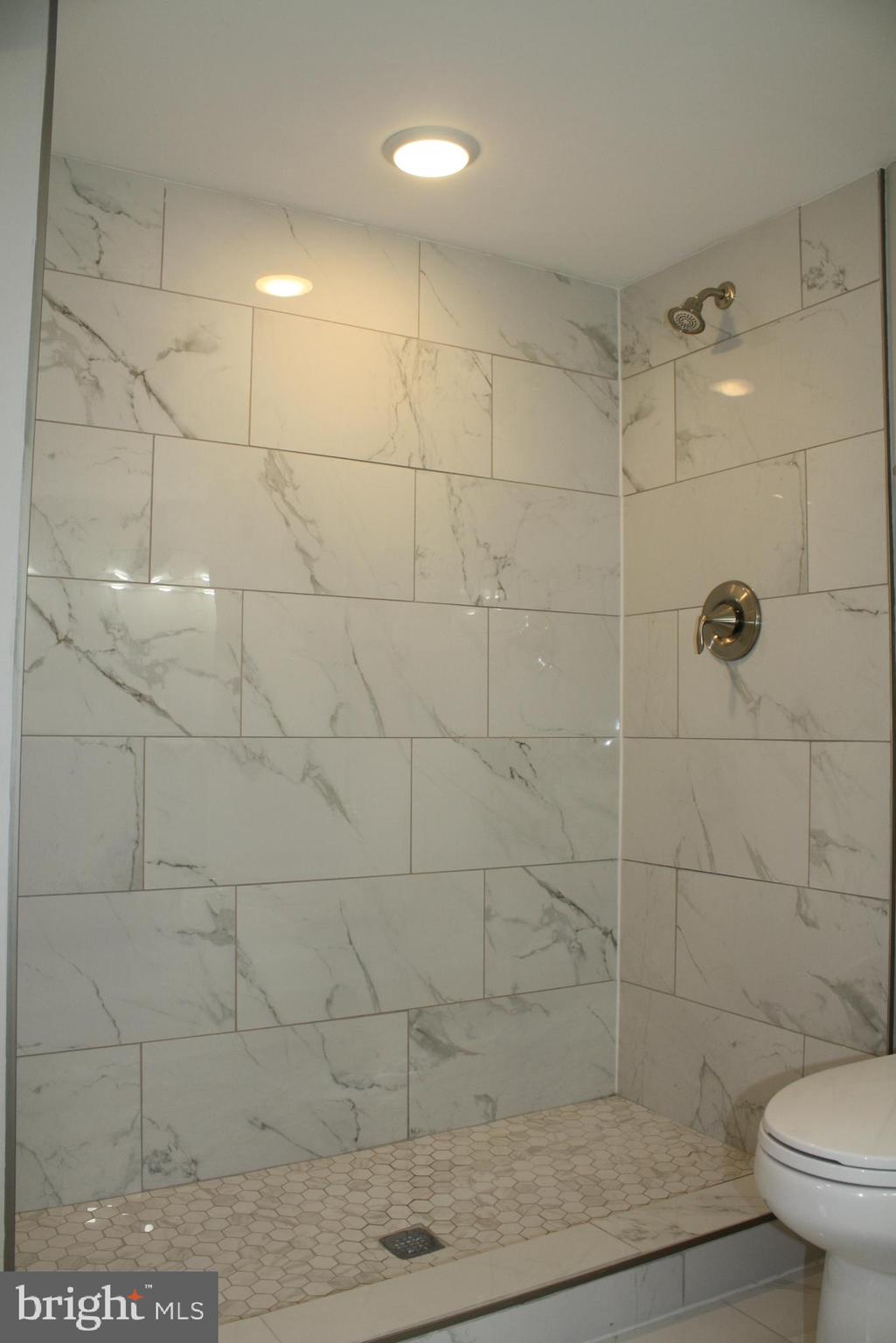 8000 Oakleigh Road Parkville, MD 21234 - Photo 21 of 28 And that walk in shower WOW!