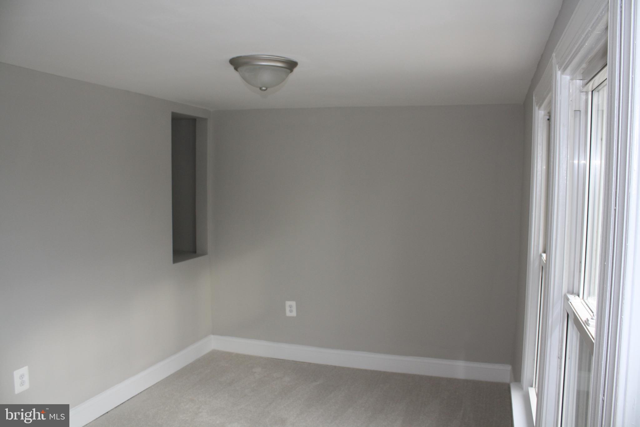 8000 Oakleigh Road Parkville, MD 21234 - Photo 23 of 28 A surprise niche for more storage in Bedroom 3