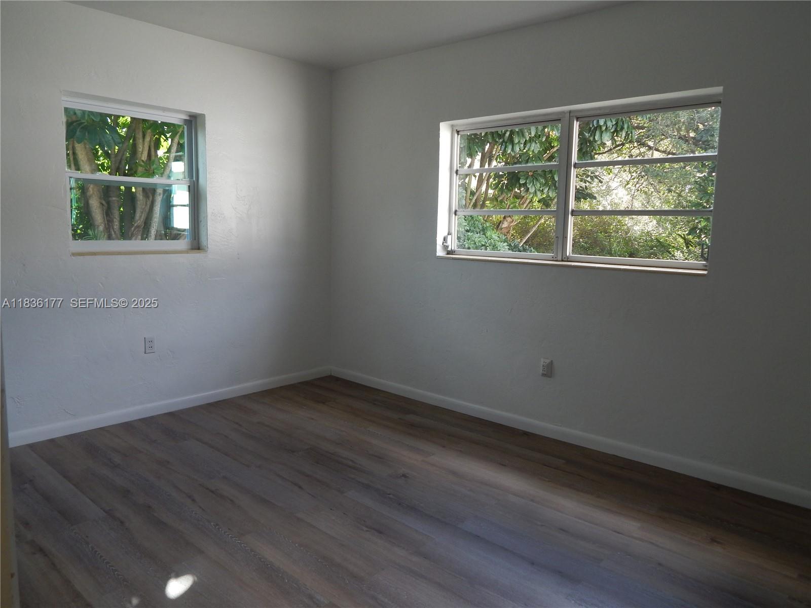 7800 Southwest 69th Avenue Miami, FL 33143 - Photo 13 of 24 an empty room with a window