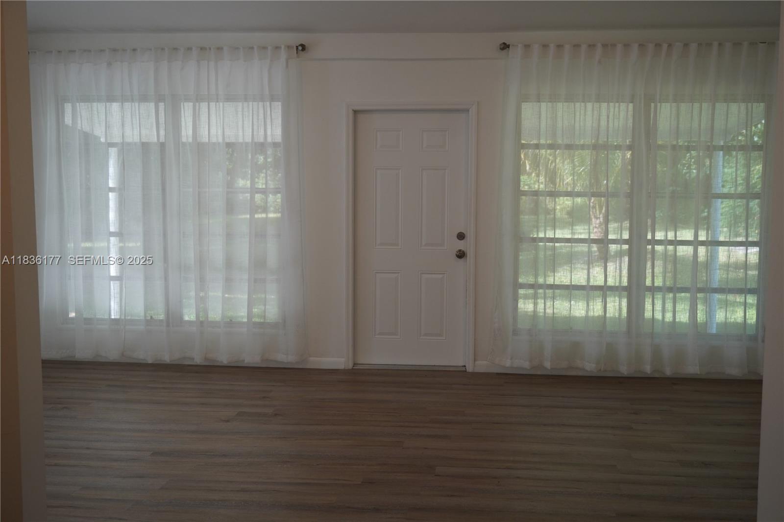 7800 Southwest 69th Avenue Miami, FL 33143 - Photo 10 of 24 a view of wooden floor and brick walls