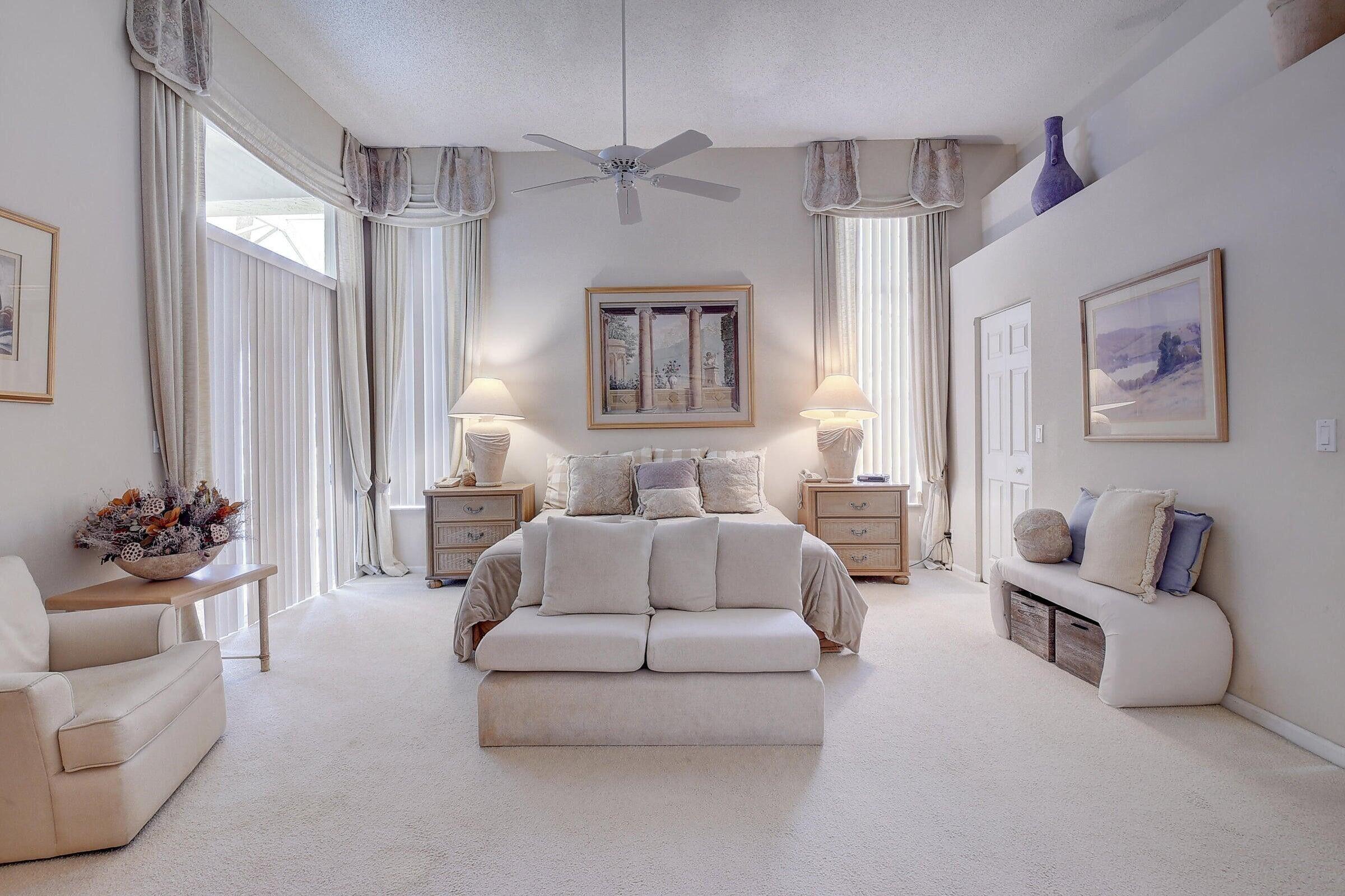 7725 Rockford Road Boynton Beach, FL 33472 - Photo 14 of 47 a living room with furniture and a large window