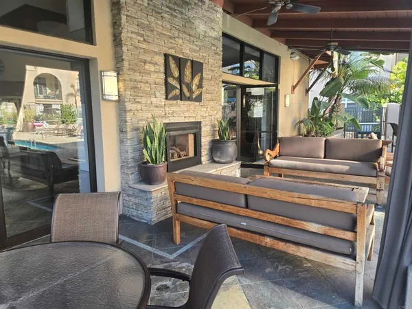 a view of a swimming pool with a lounge chairs