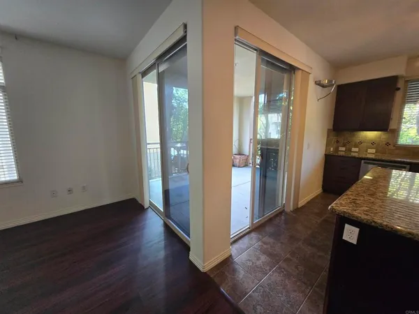 a view of a kitchen cabinets and wooden floor