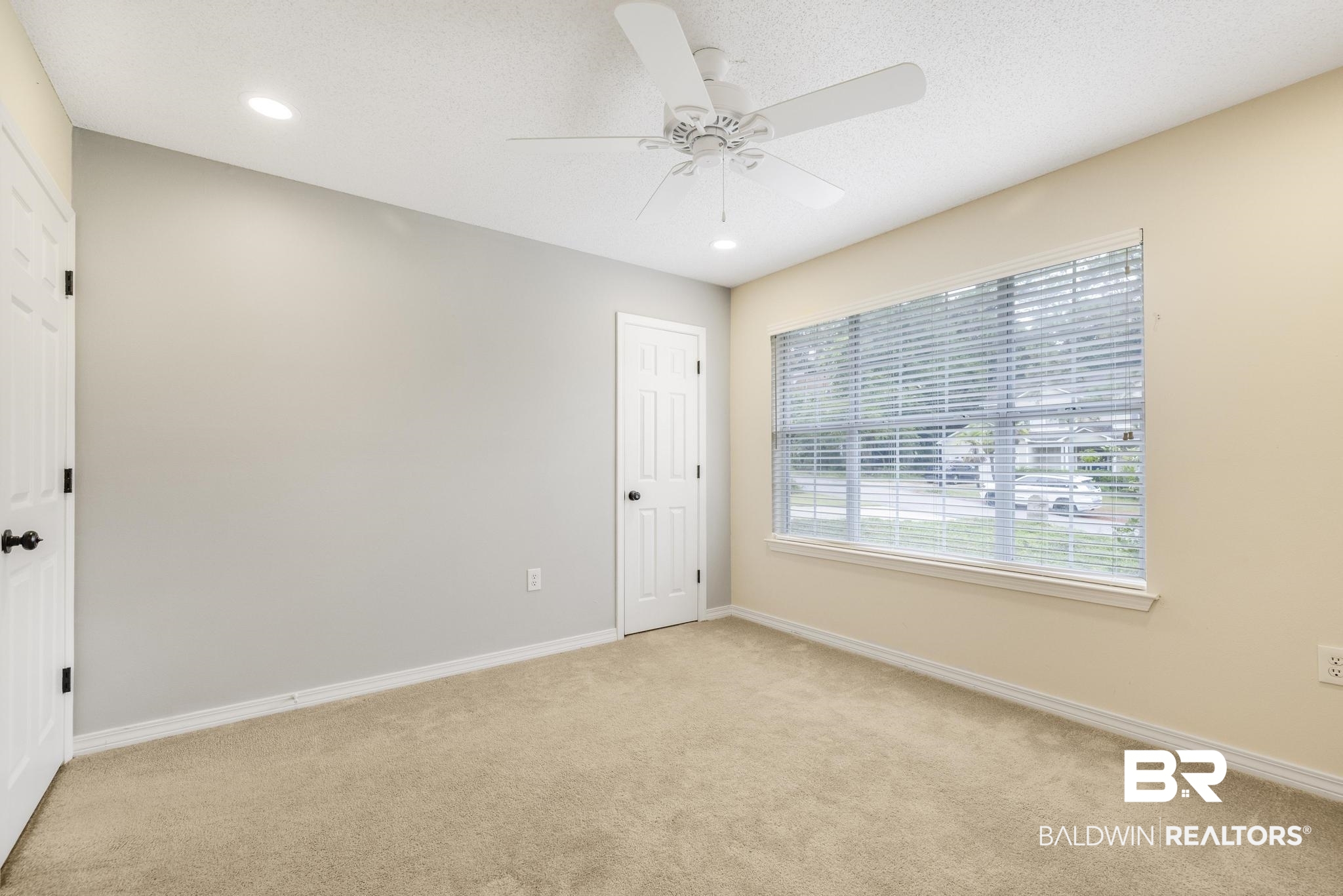 140 Hope Drive Daphne, AL 36526 - Photo 31 of 54 Unfurnished room featuring light carpet, a textured ceiling, a ceiling fan, and recessed lighting