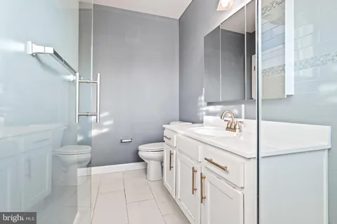 a view of a hallway with a white walls