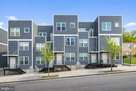 a view of a building on a street with a building on a street