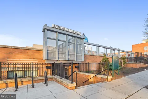 a view of a park with basketball court