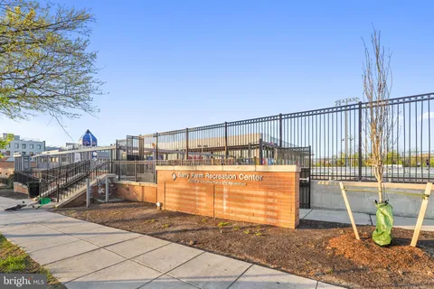 a view of a deck with a slide and swing