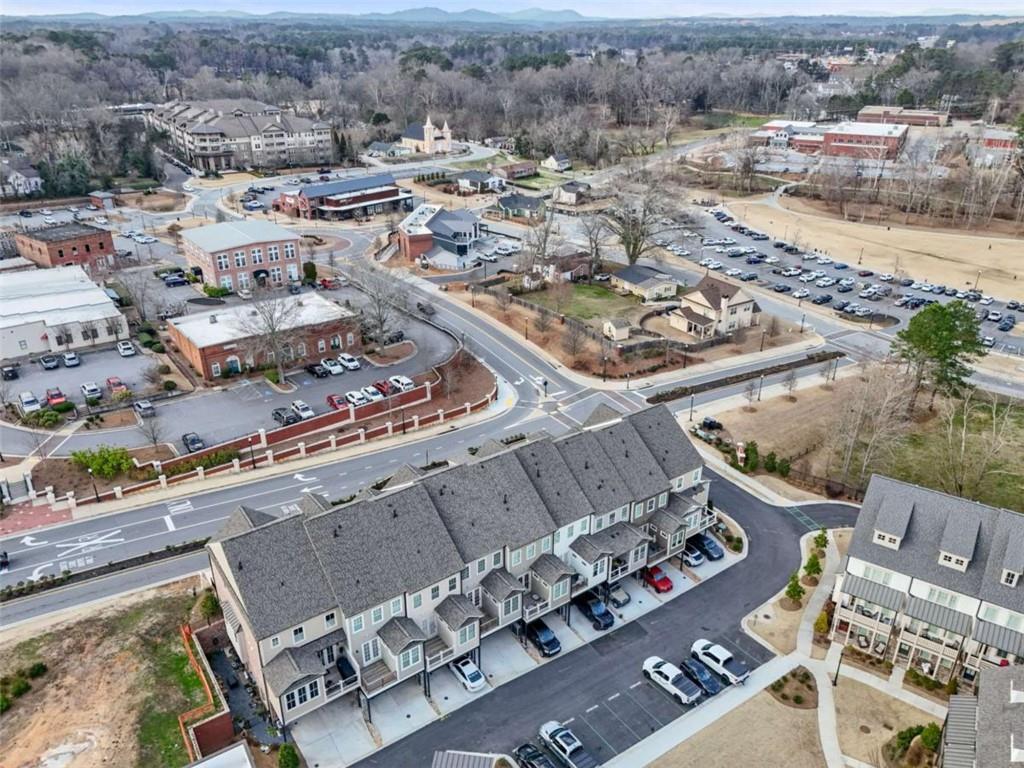 4466 Lemon Street Acworth, GA 30101 - Photo 64 of 65 an aerial view of a city with streets and houses