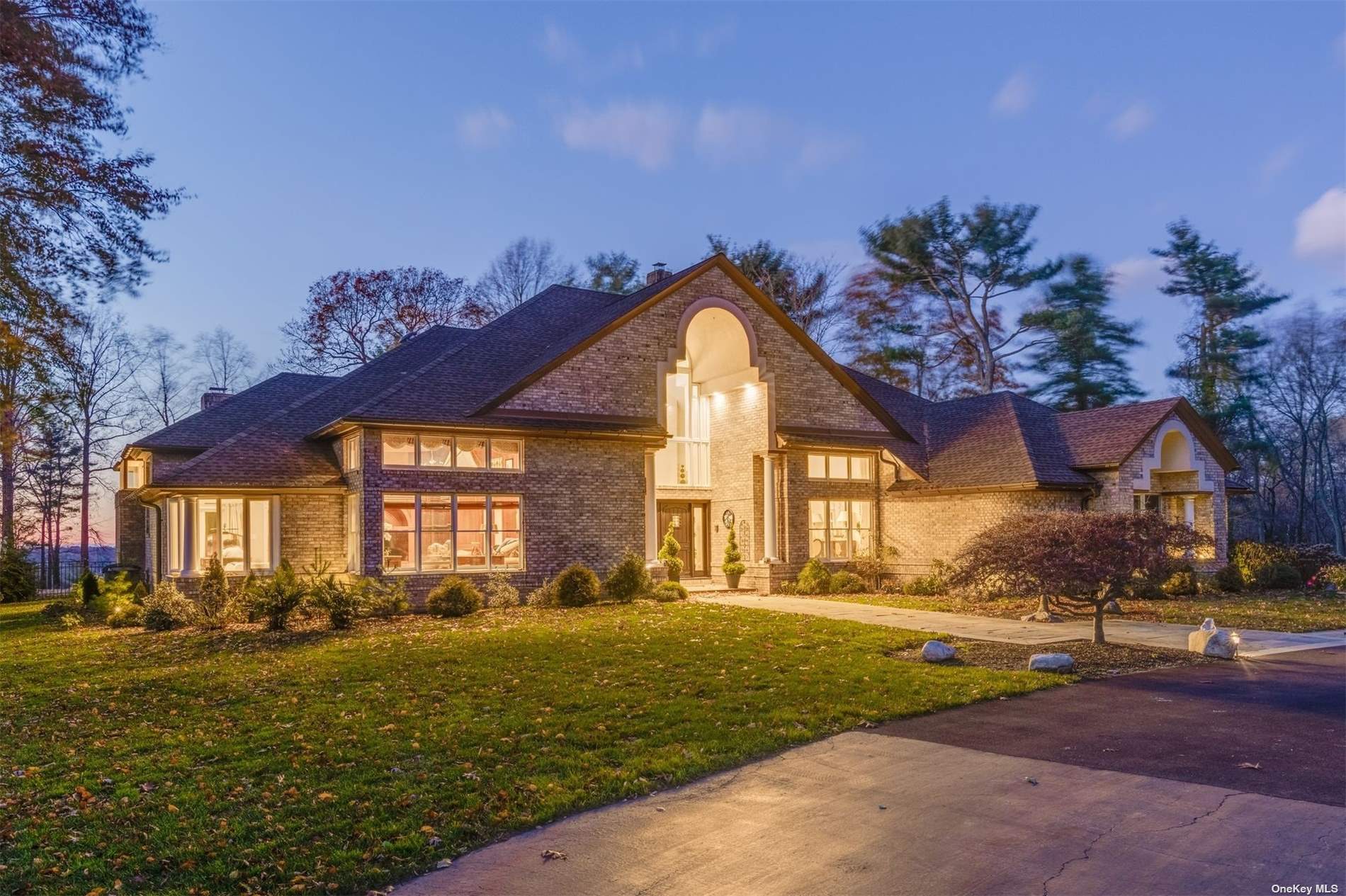 11 Saw Mill Lane Cold Spring Harbor, NY 11724 - Photo 1 of 1 a front view of house with yard and green space