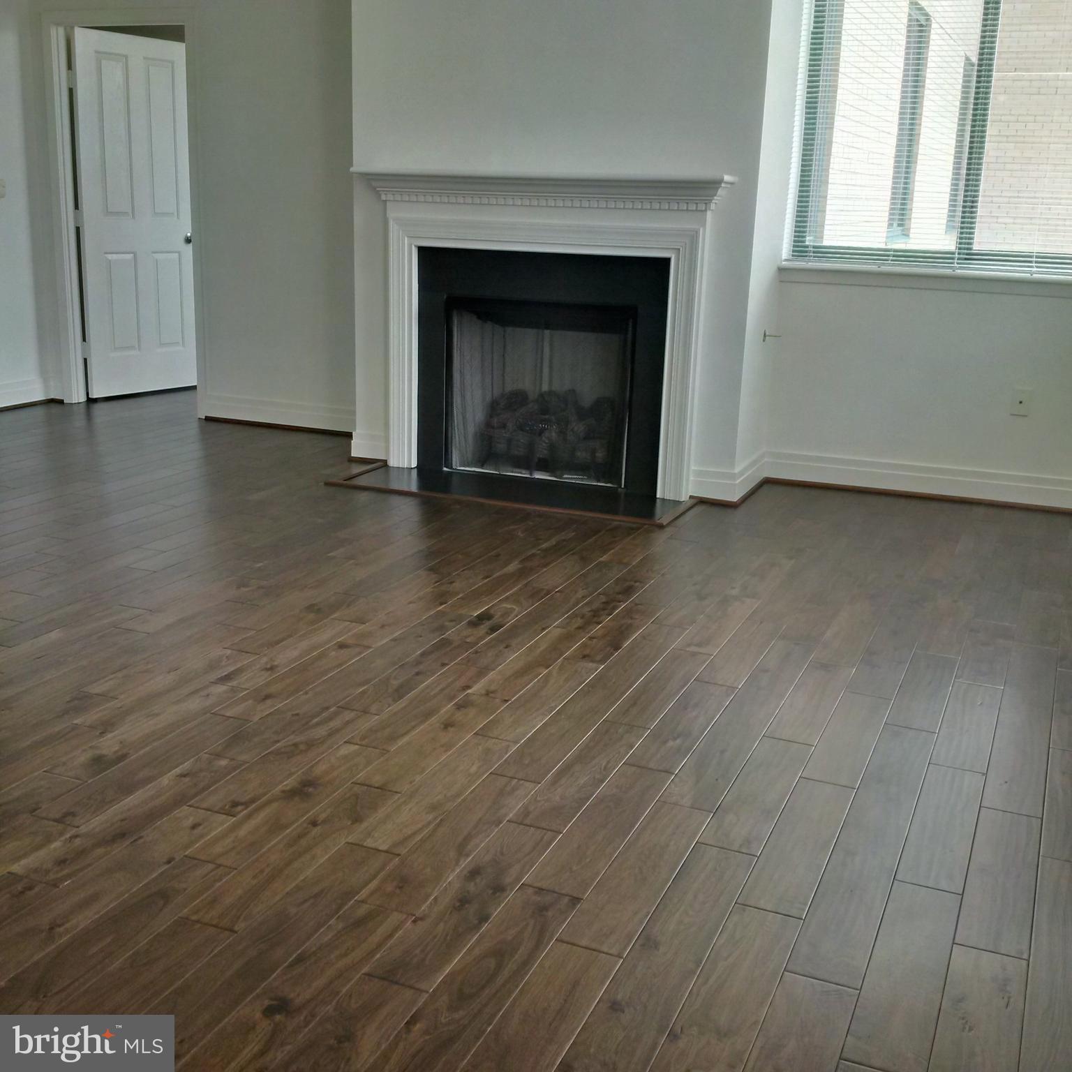 414 Water Street, Unit 2913 Baltimore, MD 21202 - Photo 7 of 10 SAMPLE of NEW Hardwood included in home price.