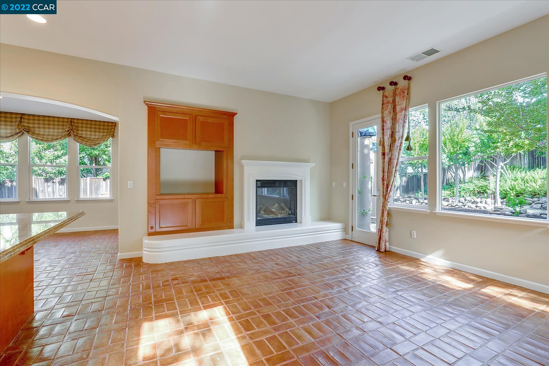 109 Elegans Court San Ramon, CA 94582 - Photo 18 of 41 a view of an empty room with wooden floor and a window