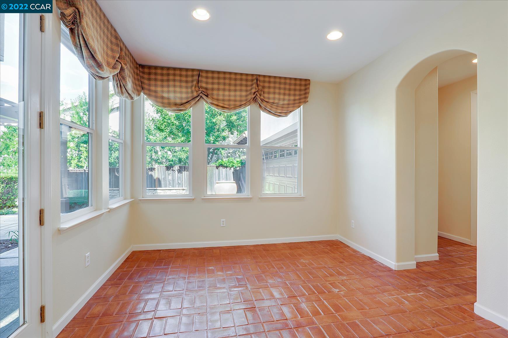 109 Elegans Court San Ramon, CA 94582 - Photo 25 of 41 a view of empty room with wooden floor and fan