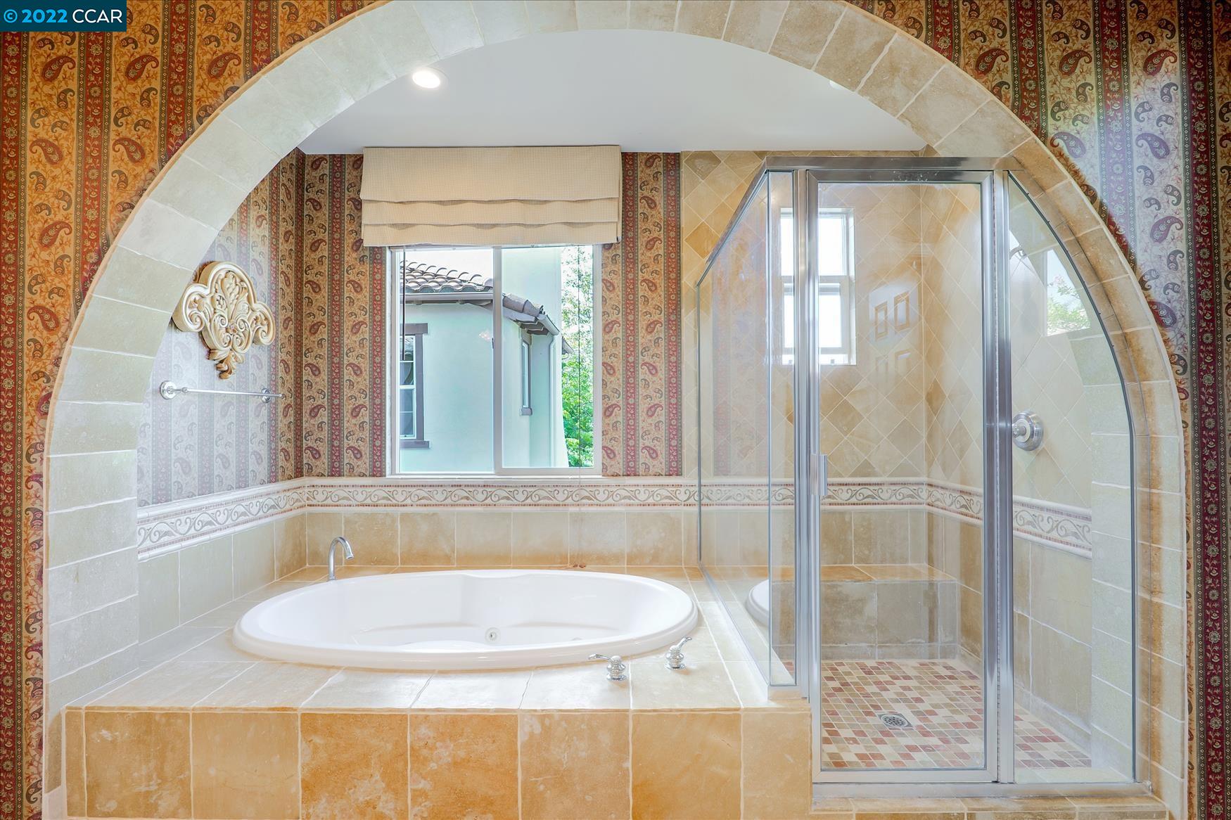 109 Elegans Court San Ramon, CA 94582 - Photo 37 of 41 a bathroom with a tub and shower