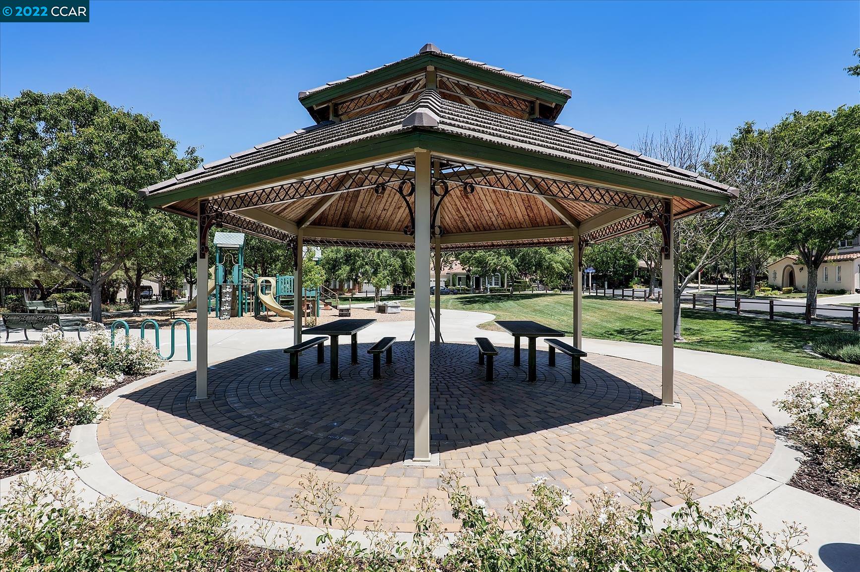 109 Elegans Court San Ramon, CA 94582 - Photo 40 of 41 a view of a table and chairs under an umbrella