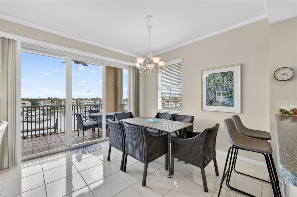 2060 Matecumbe Key Road, Unit 2506 Punta Gorda, FL 33955 - Photo 5 of 38 a view of a dining room with furniture window and outside view