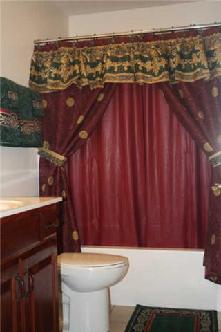 8448 North Pinson Road Portland, TN 37148 - Photo 14 of 20 a bathroom with a sink and a toilet