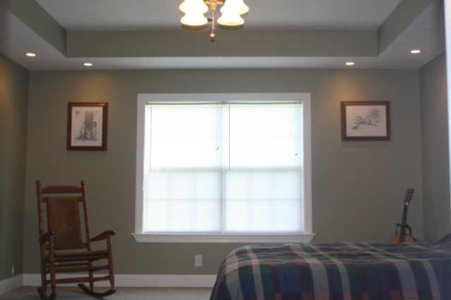 8448 North Pinson Road Portland, TN 37148 - Photo 7 of 20 a bedroom with a bed and a window