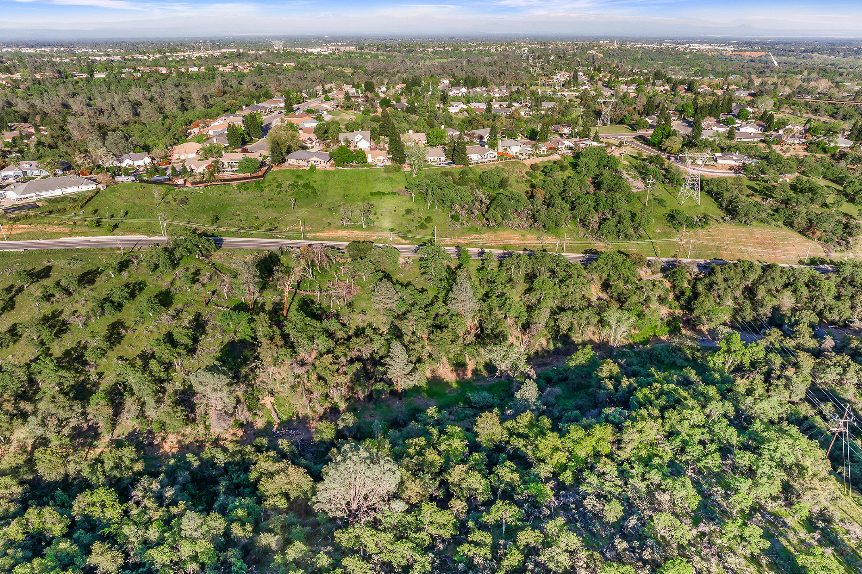 166 Quartz Hill Road Redding, CA 96003 - Photo 20 of 34 an aerial view of residential houses with outdoor space and trees