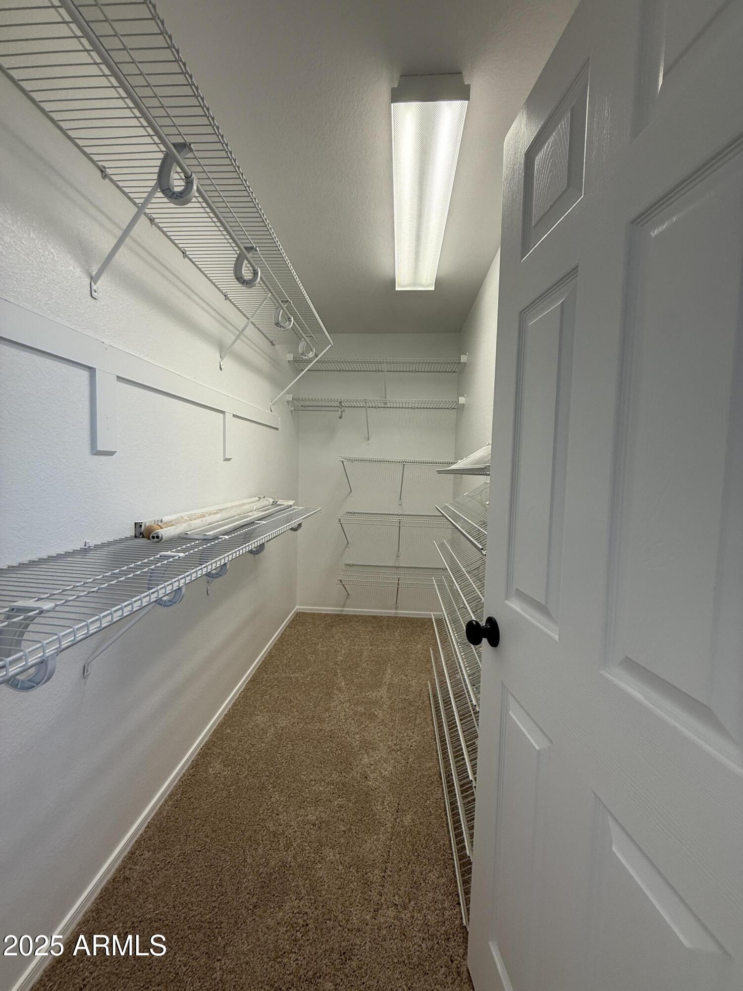 1265 South Aaron, Unit 277 Mesa, AZ 85209 - Photo 12 of 37 a view of a garage