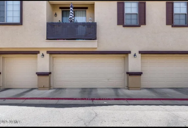 a view of a hallway with a chandelier