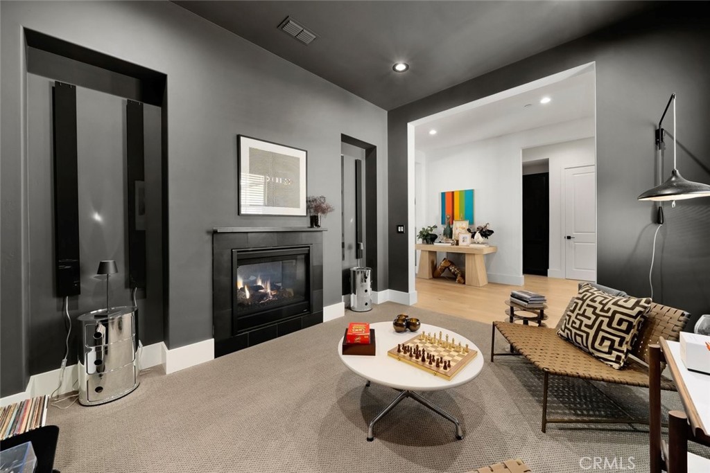 1335 Riley Lane Nipomo, CA 93444 - Photo 21 of 58 a living room with furniture and a fireplace