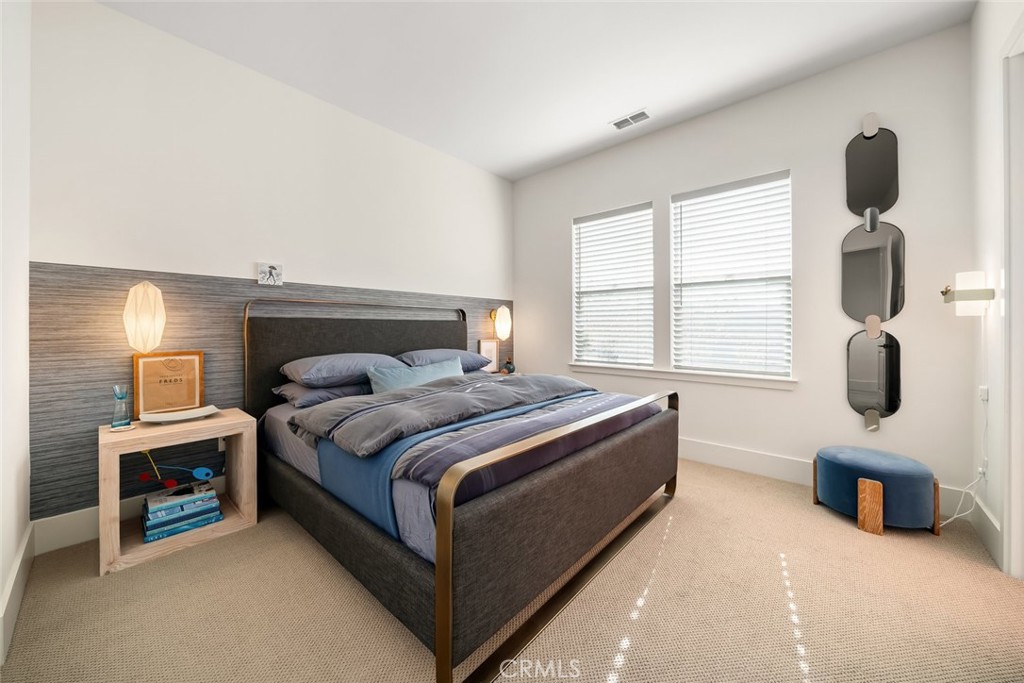 1335 Riley Lane Nipomo, CA 93444 - Photo 34 of 69 a bed room with a bed and a fireplace