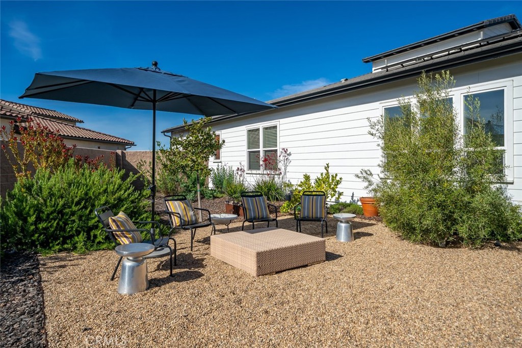 1335 Riley Lane Nipomo, CA 93444 - Photo 46 of 69 a view of a patio with couches and potted plants