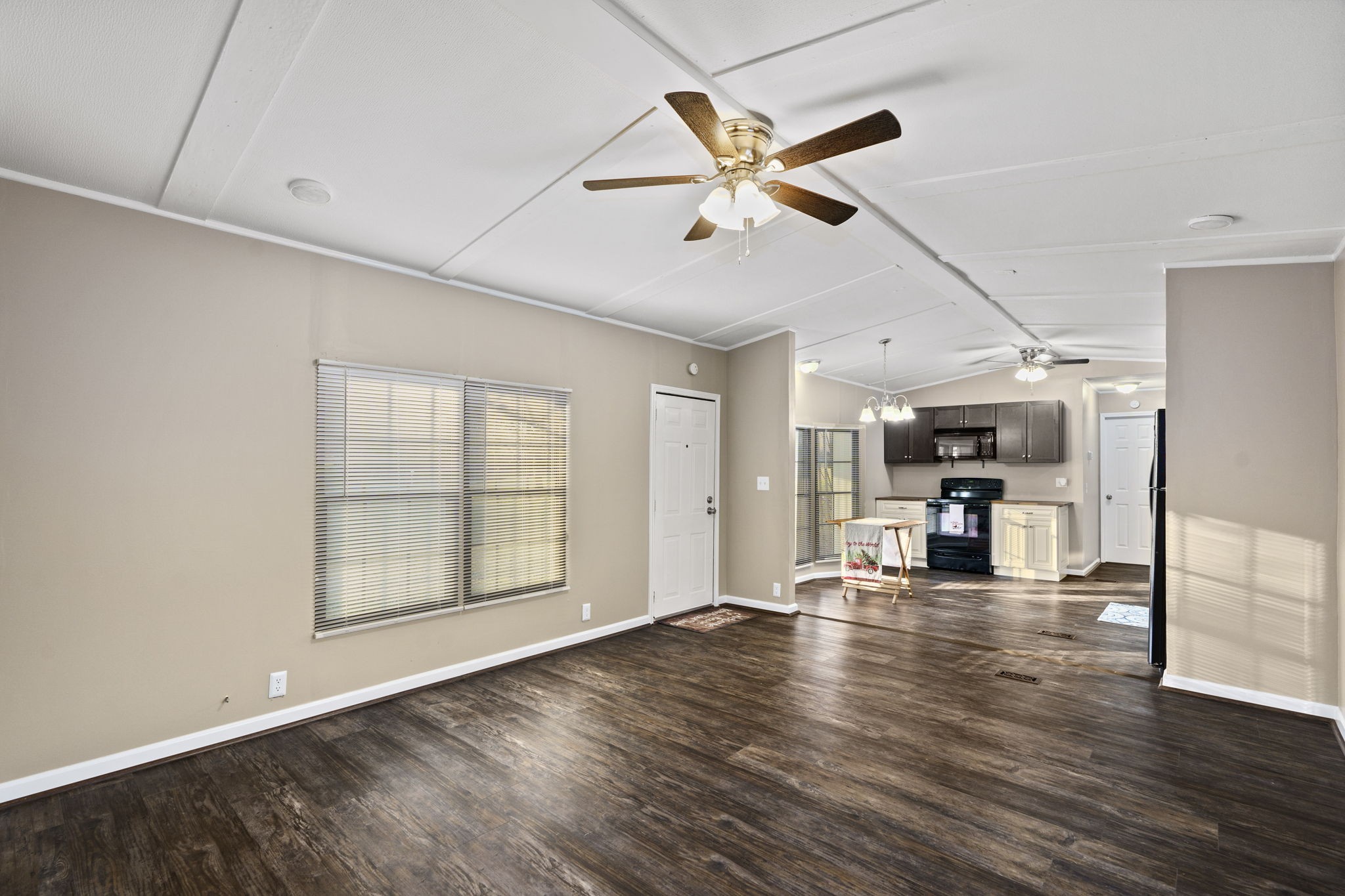 3855 Baggett Road Springfield, TN 37172 - Photo 5 of 42 a view of an empty room with wooden floor and a window