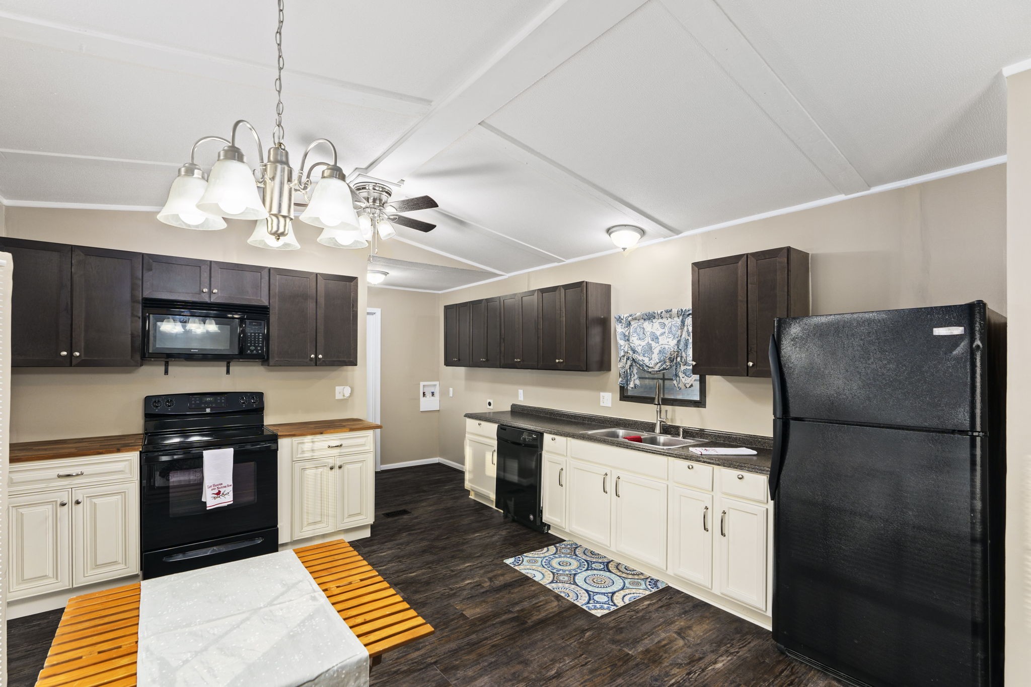 3855 Baggett Road Springfield, TN 37172 - Photo 7 of 42 a kitchen with stainless steel appliances a sink a stove a refrigerator cabinets and a kitchen island