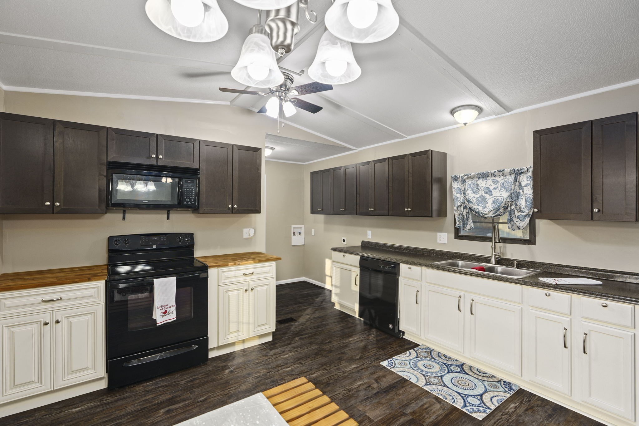 3855 Baggett Road Springfield, TN 37172 - Photo 10 of 42 a kitchen with a sink stainless steel appliances and cabinets