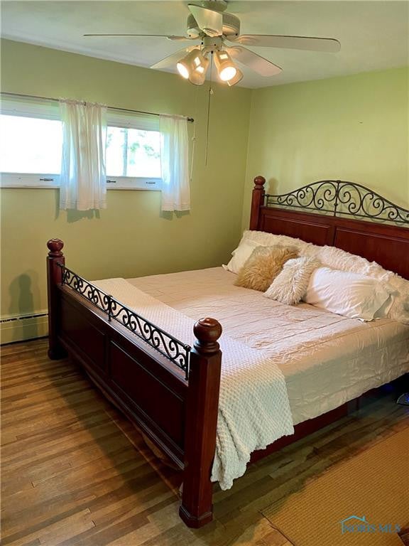 3929 Seaman Road Oregon, OH 43616 - Photo 25 of 50 Mater bedroom w/ hardwood floors & ceiling fan.