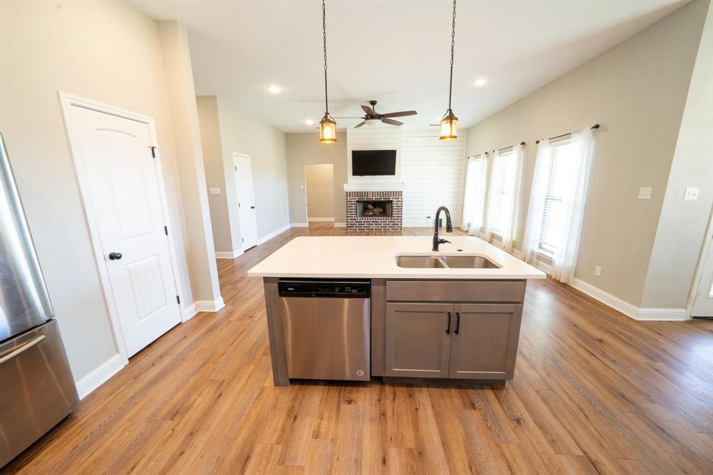 132 Addie Way Tuscola, TX 79562 - Photo 21 of 37 a spacious bathroom with a double vanity sink and a mirror