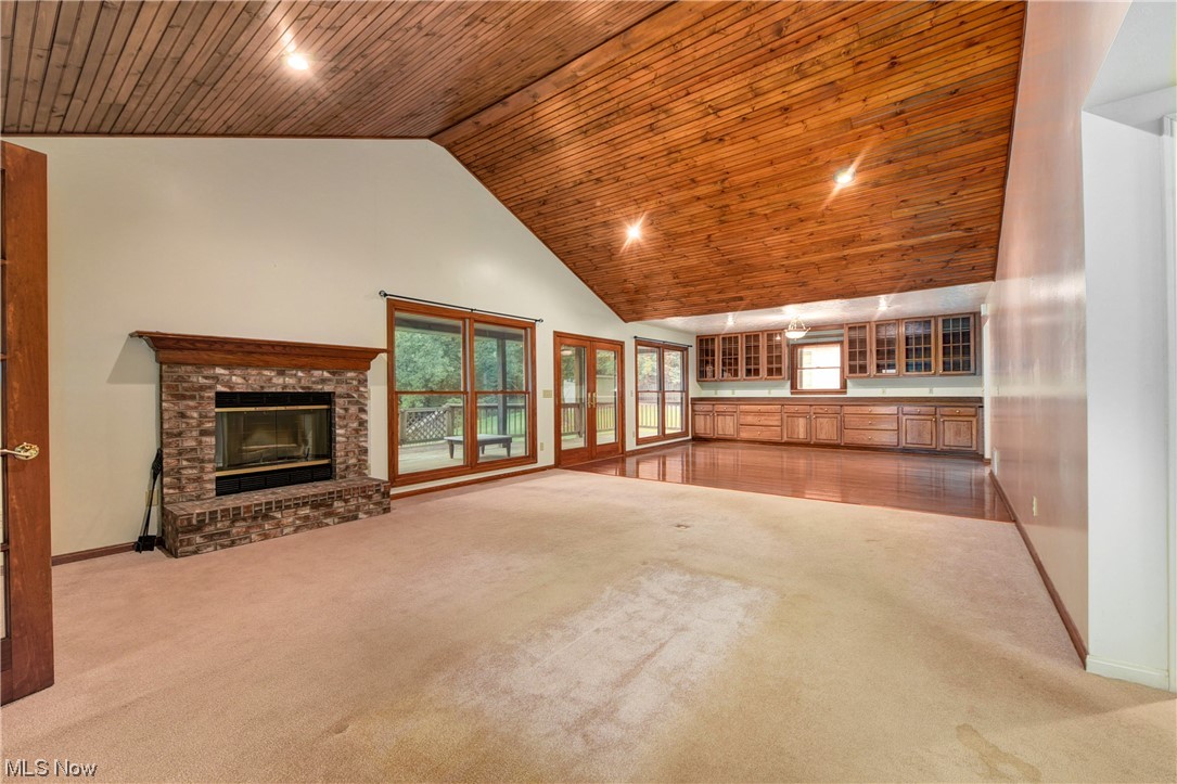 4050 Boston Road Brunswick, OH 44212 - Photo 8 of 30 Vaulted ceiling and fireplace