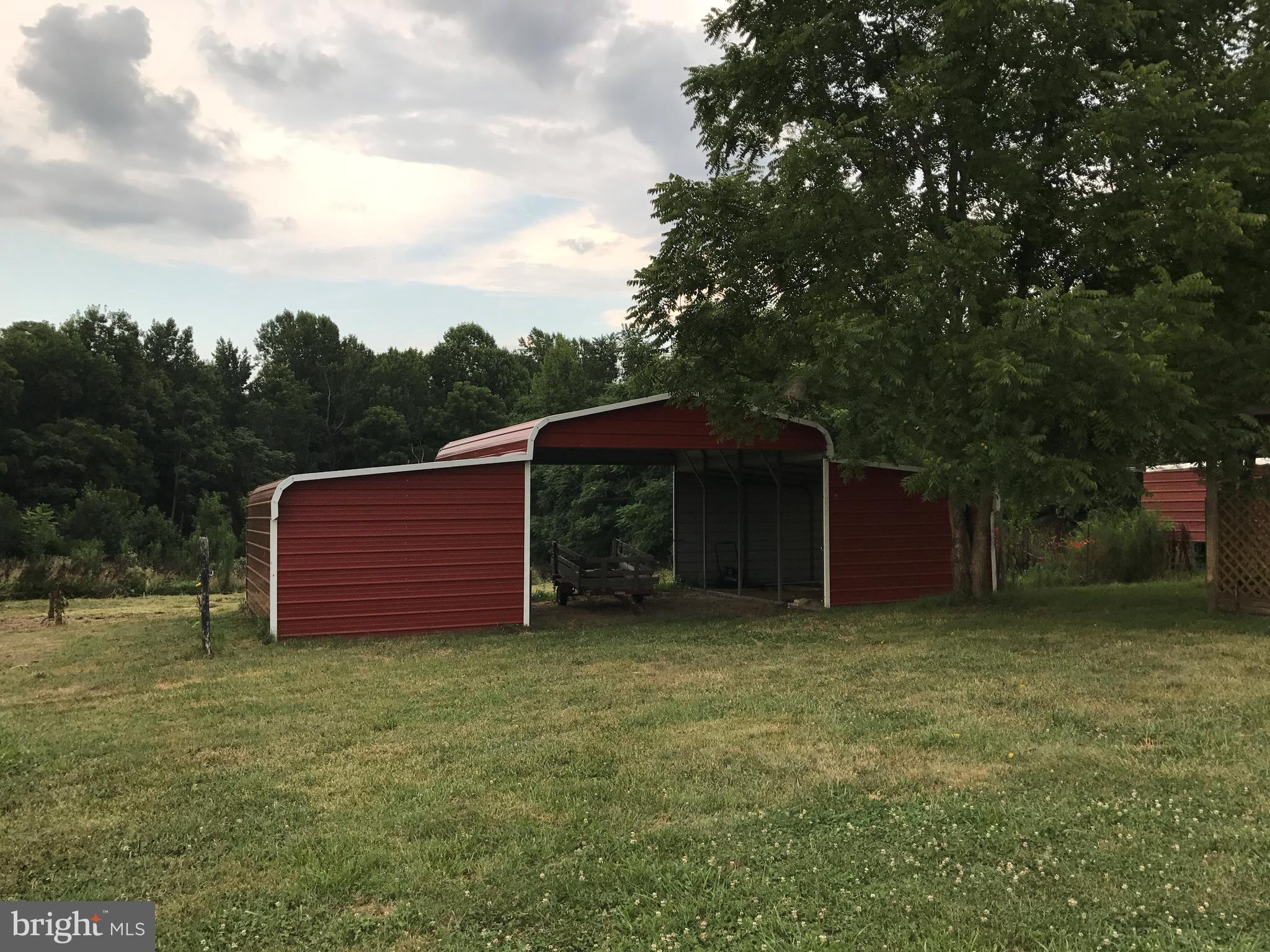 11641 Belfonte Road Bumpass, VA 23024 - Photo 2 of 23 a view of a backyard