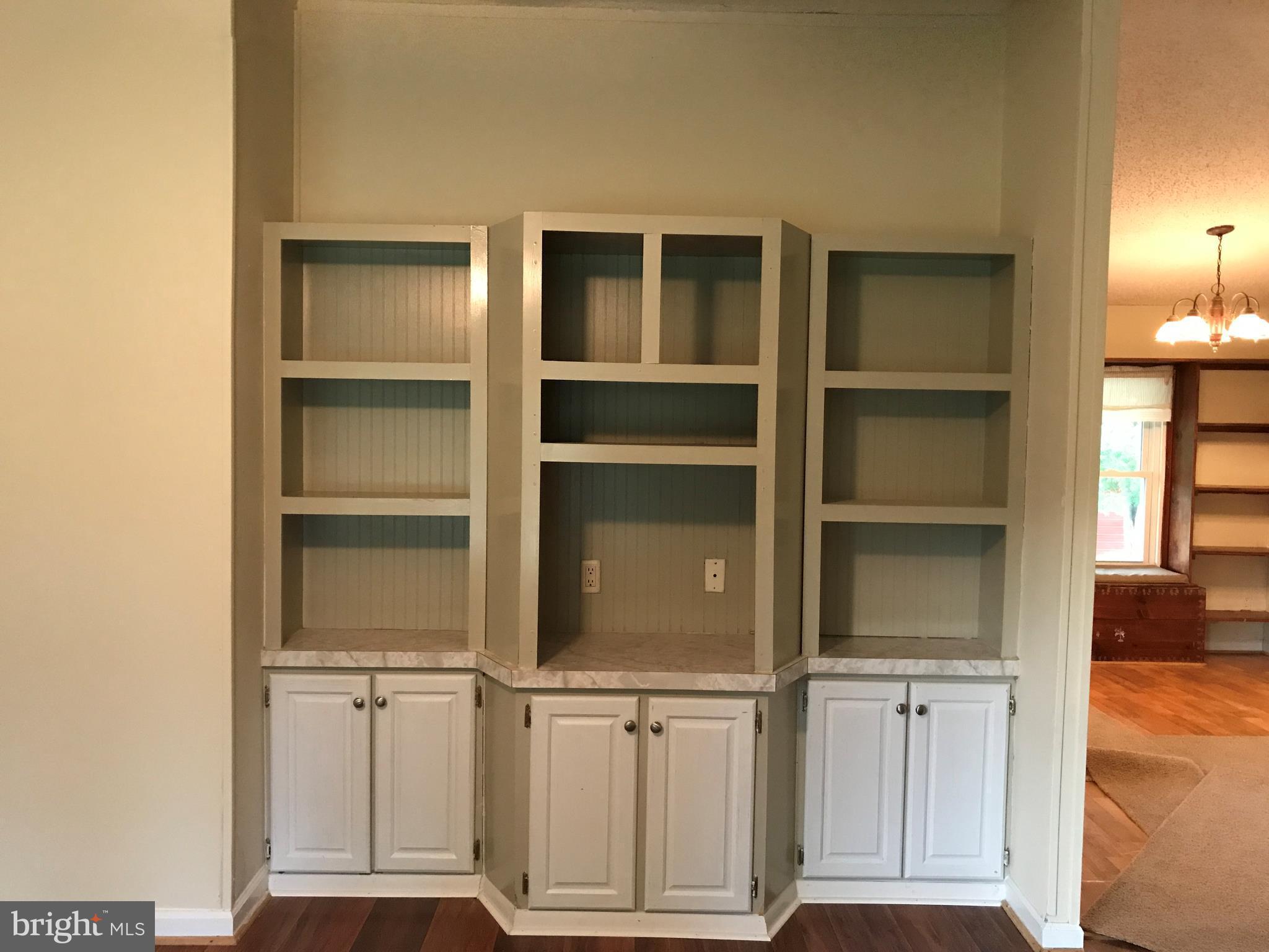 11641 Belfonte Road Bumpass, VA 23024 - Photo 18 of 23 a view of walk in closet with empty racks