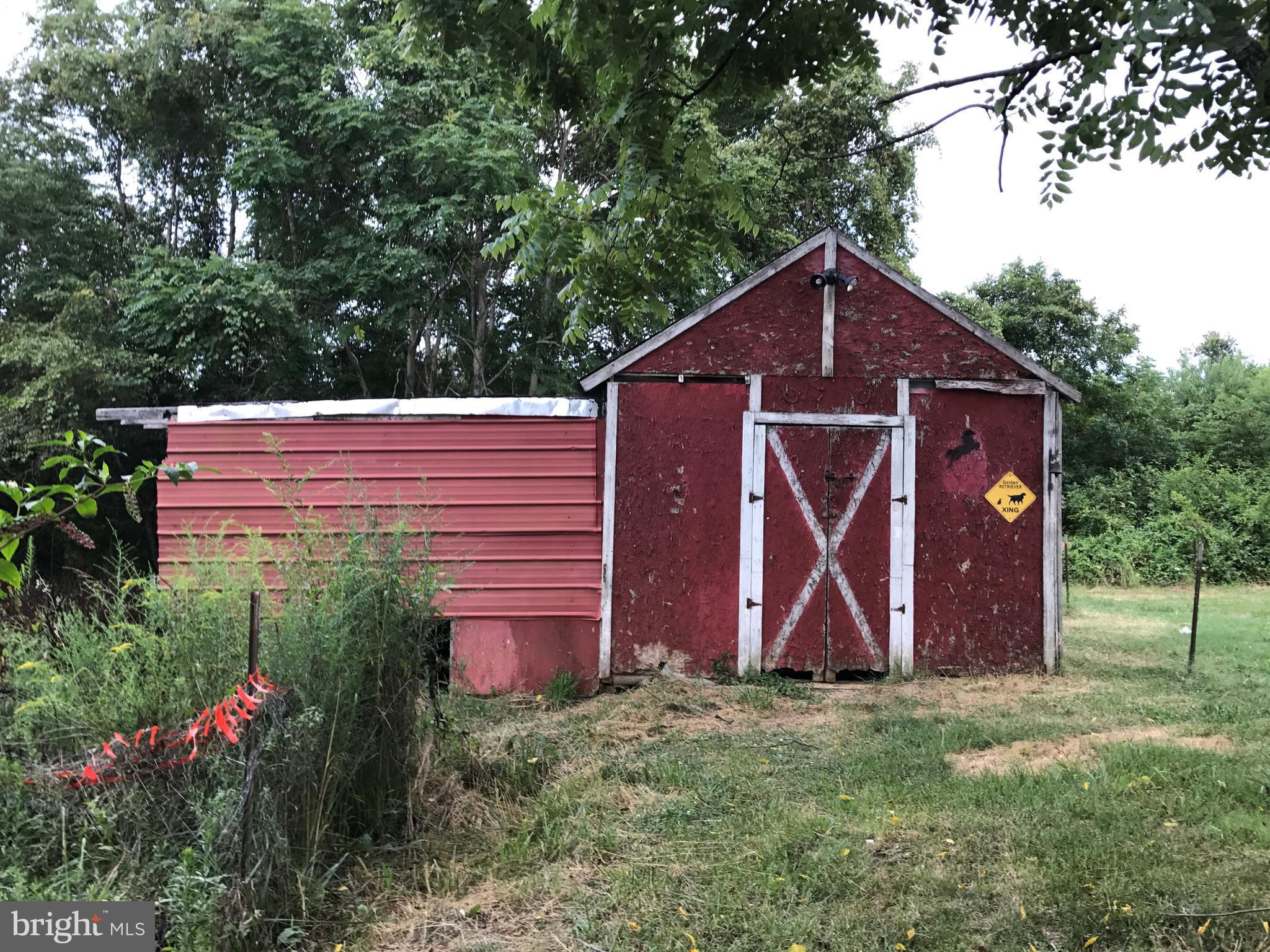 11641 Belfonte Road Bumpass, VA 23024 - Photo 4 of 23 a view of barn with a small yard