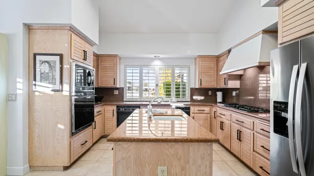 a view of a city with mountains in the background