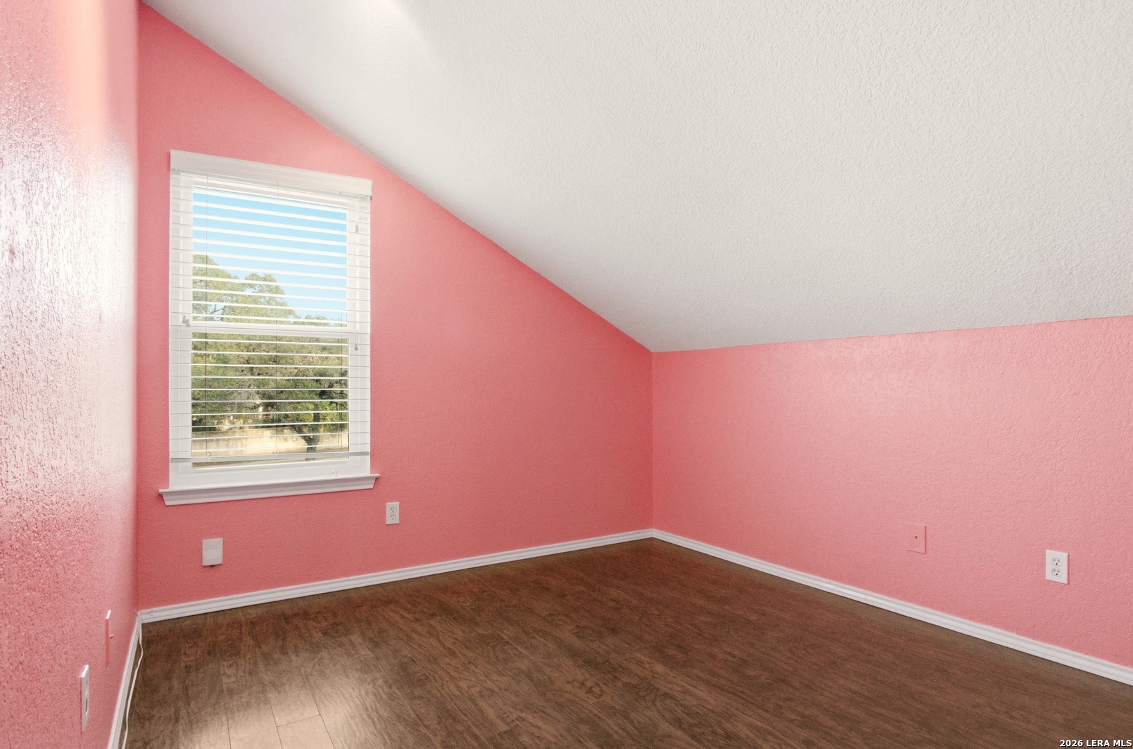 2434 Canyon Rim San Antonio, TX 78232 - Photo 21 of 28 an empty room with wooden floor and windows