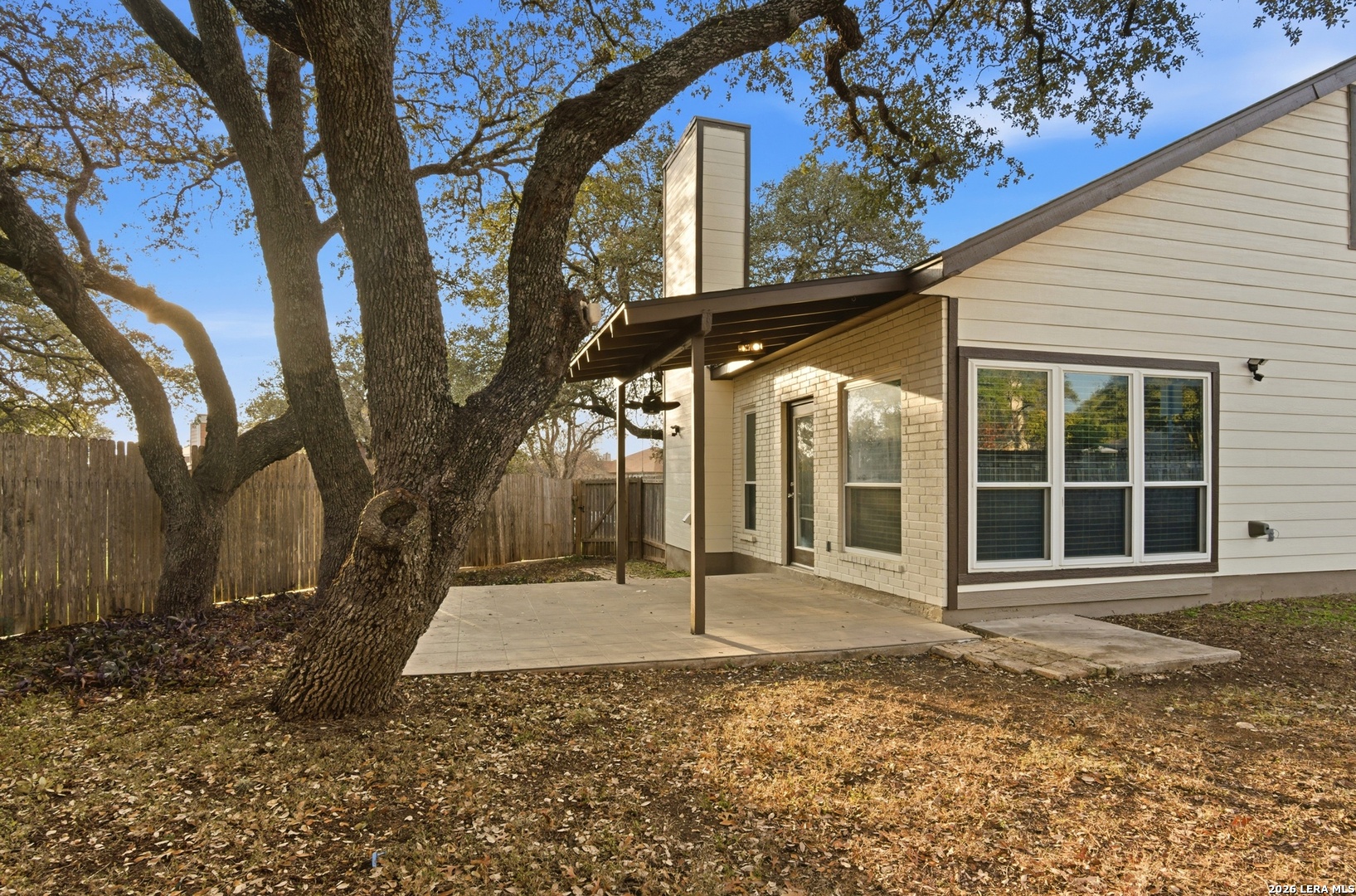 2434 Canyon Rim San Antonio, TX 78232 - Photo 23 of 28 a view of a house with a yard