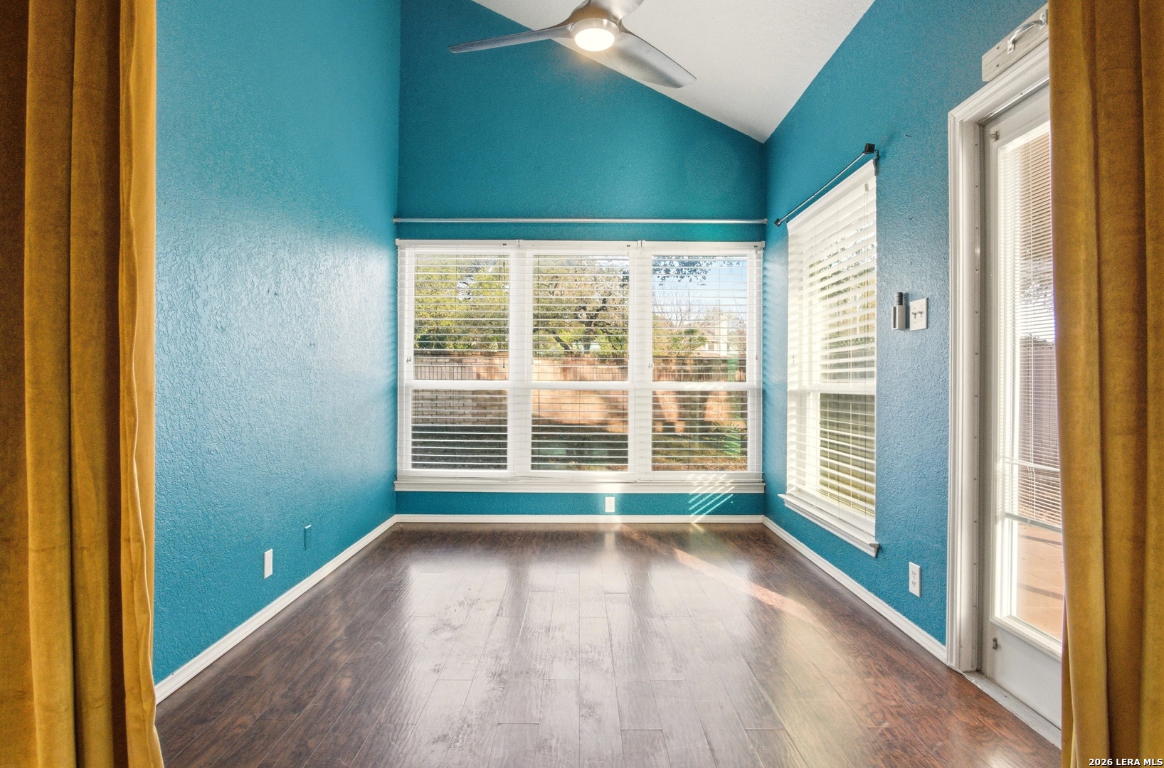 2434 Canyon Rim San Antonio, TX 78232 - Photo 6 of 28 a view of empty room with wooden floor and fan