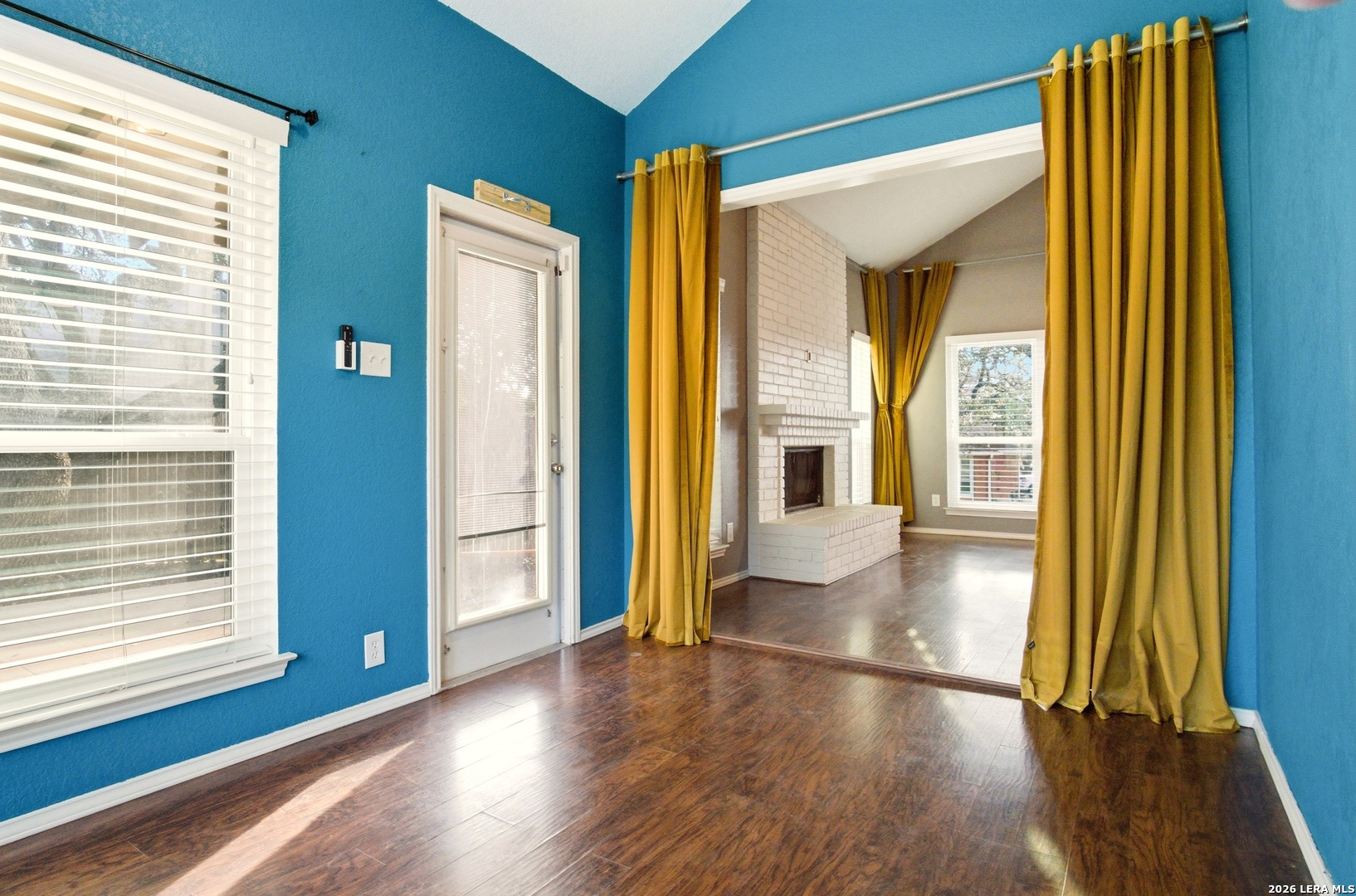 2434 Canyon Rim San Antonio, TX 78232 - Photo 7 of 28 a view of an entryway with wooden floor and windows