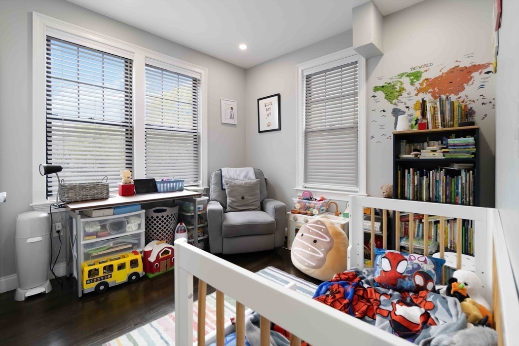 18 Albion Street, Unit 2 Boston, MA 02119 - Photo 11 of 22 a room with lots of baby toys