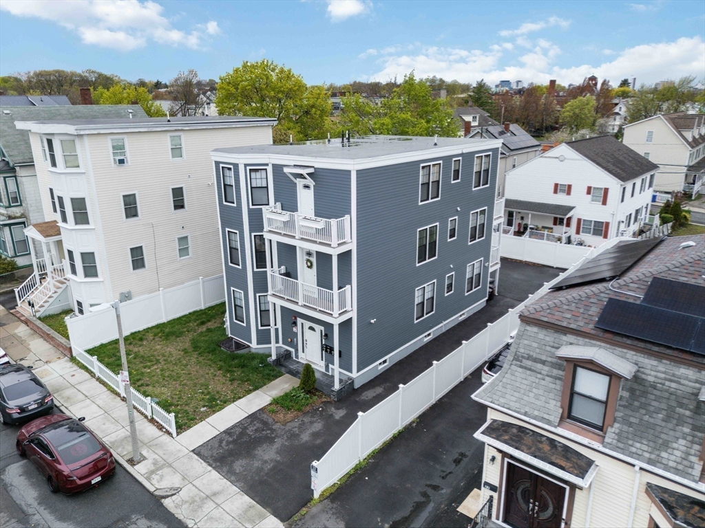 18 Albion Street, Unit 2 Boston, MA 02119 - Photo 15 of 22 a view of a street with a building